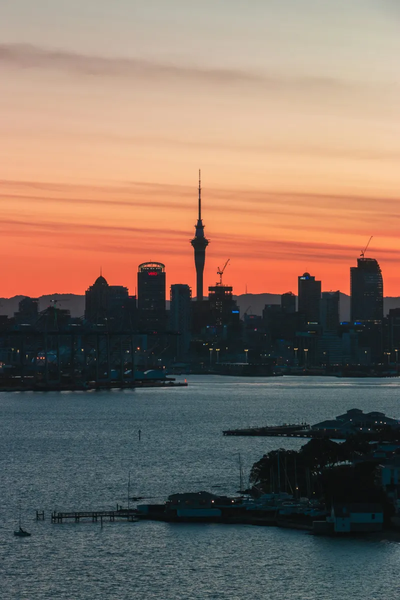 Auckland harbour and skyline at dusk - visiting New Zealand